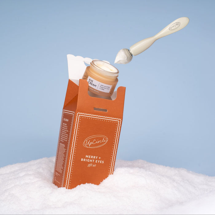 product image-18,UpCircle Merry + Bright Eyes Gift Set: Gift set with Eye Cream pot open showing texture