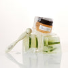 product image-3,UpCircle Merry + Bright Eyes Gift Set: UpCircle Eye Cream and Eye Roller Massage Tool together in a lifestyle setting