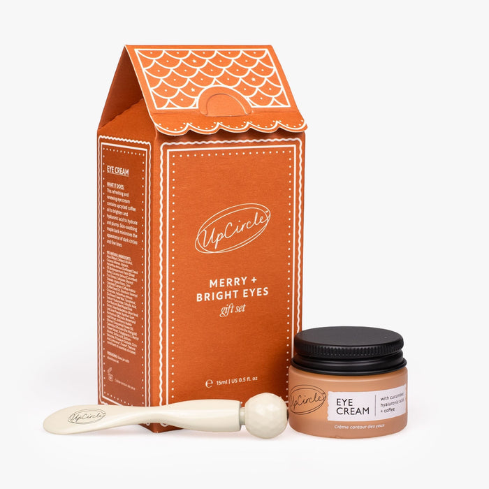 small product image-12,UpCircle Merry + Bright Eyes Gift Set: Eye Cream, Eye Roller and gingerbread house gift box on white background